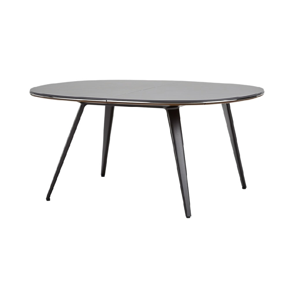 Ronde zwarte eettafel met slanke poten